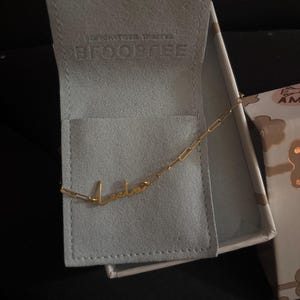 Customer photo, Cursive Name Necklace