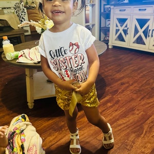Monica added a photo of their purchase
