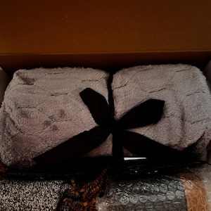 Migdalia added a photo of their purchase
