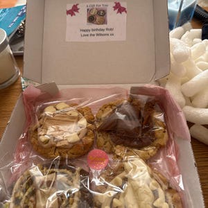 Caitlin added a photo of their purchase