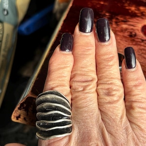Sheryl added a photo of their purchase