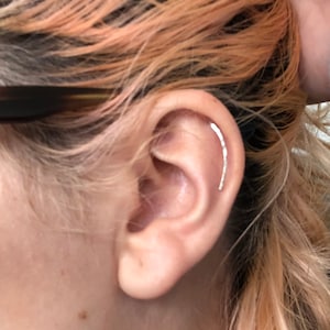 Sarah added a photo of their purchase