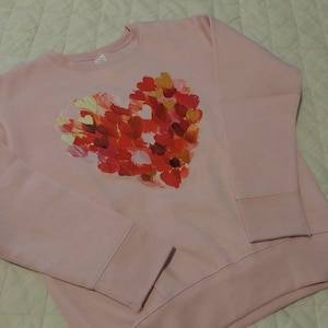 Laura added a photo of their purchase