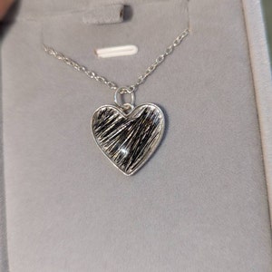 Katrina added a photo of their purchase