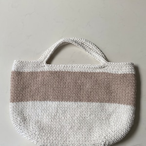 Mariam added a photo of their purchase