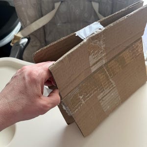 Laura added a photo of their purchase