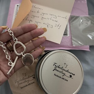 Sharon added a photo of their purchase