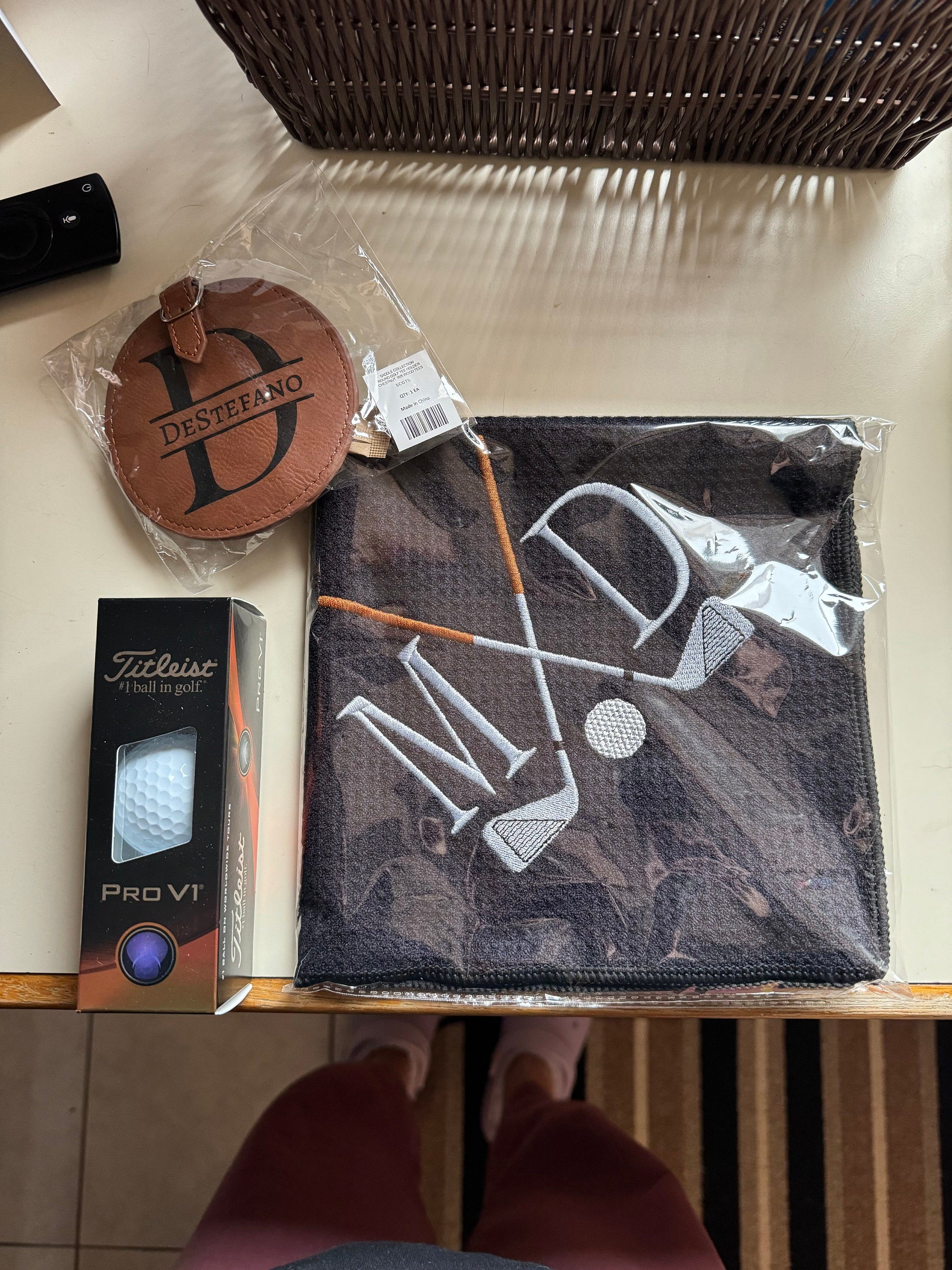Personalized Golf Gift Box. Include a golf towel, a set of three golf Pro V1 balls with monograms, and a golf bag tag with tee holder