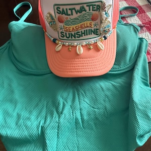 Sasha added a photo of their purchase
