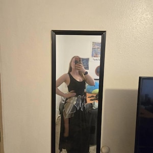 Nicole added a photo of their purchase