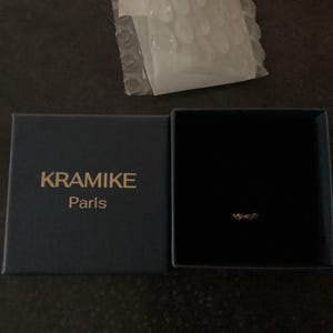 Emmanuelle added a photo of their purchase