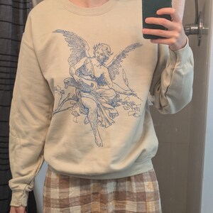 Masha added a photo of their purchase