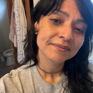 Tatiana added a photo of their purchase