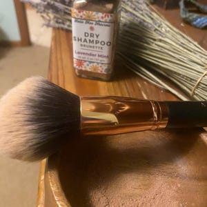 Lisa added a photo of their purchase