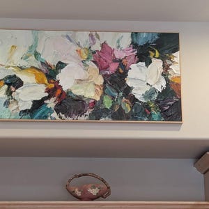 Sue added a photo of their purchase