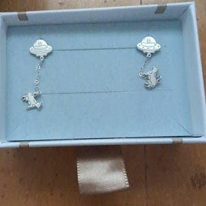 Customer photo, Cow Abduction Stud Earrings
