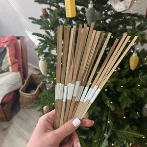 Elle added a photo of their purchase