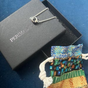 Sheena added a photo of their purchase