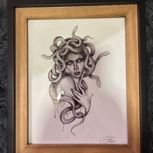 Kyra added a photo of their purchase