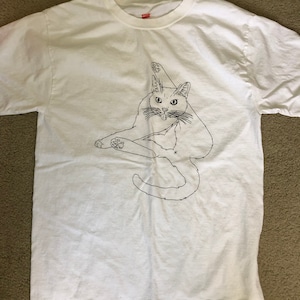 Cat licking shirt sales