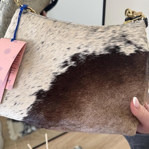 Gabby added a photo of their purchase