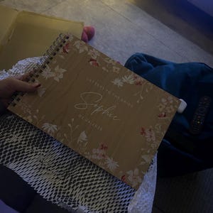Emily added a photo of their purchase