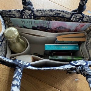 Nina added a photo of their purchase