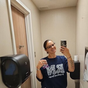 Roxanne added a photo of their purchase