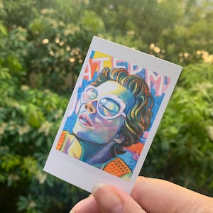 Carmela added a photo of their purchase