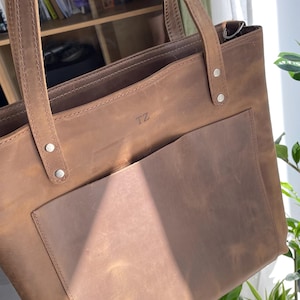 Tatiana added a photo of their purchase