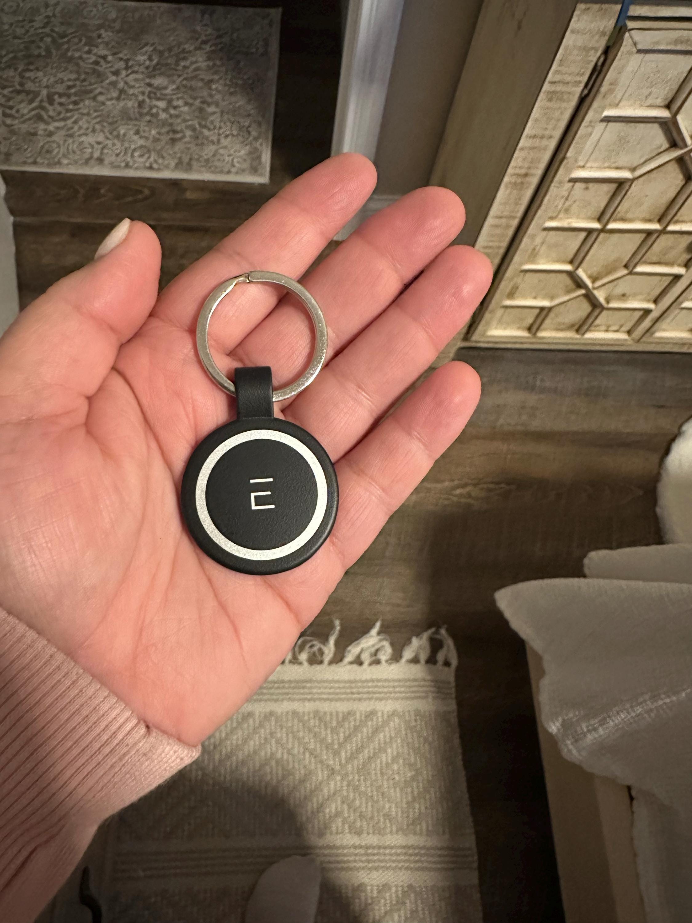 Customer photo of Custom Logo Etched Black Metal Keychains from Lisa