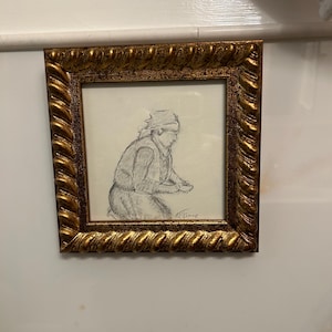 Laura added a photo of their purchase