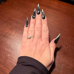 Samantha added a photo of their purchase