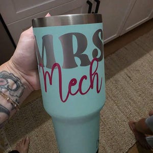 Sarah added a photo of their purchase
