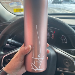 Natasha added a photo of their purchase