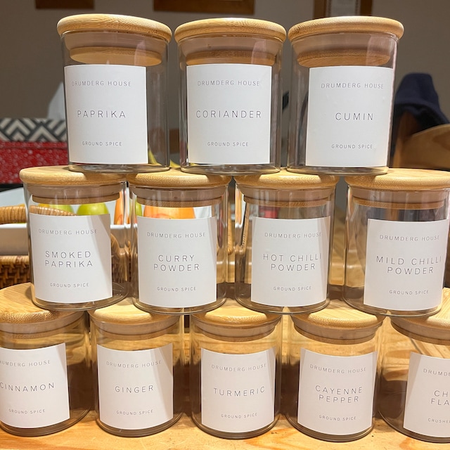 Elevated Habitat 12 eco-friendly Spice Jars Glass with airtight silicone  seals, bamboo lids and 130 pre printed spice labels. Storage containers
