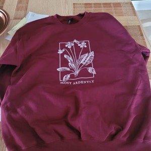 Alexandra added a photo of their purchase