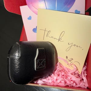Mercié added a photo of their purchase