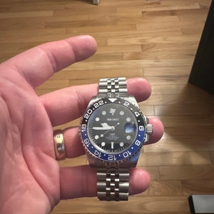 Alexander added a photo of their purchase
