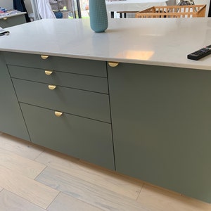 Sarah added a photo of their purchase