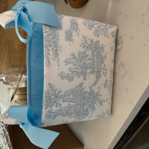 Holly added a photo of their purchase
