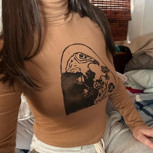 Gina added a photo of their purchase