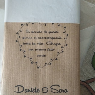 Sacchettini portaconfetti rosa a righe con fiocco e gessetto cuore