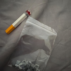 elfbar nachfüll pod läuft aus Lego Inspired Cigarette With Ceramic Ash Tray
