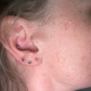 Semicolon tragus shop earring