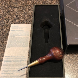 Andrew added a photo of their purchase