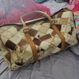 Yasmine added a photo of their purchase