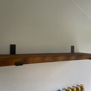 Sam added a photo of their purchase
