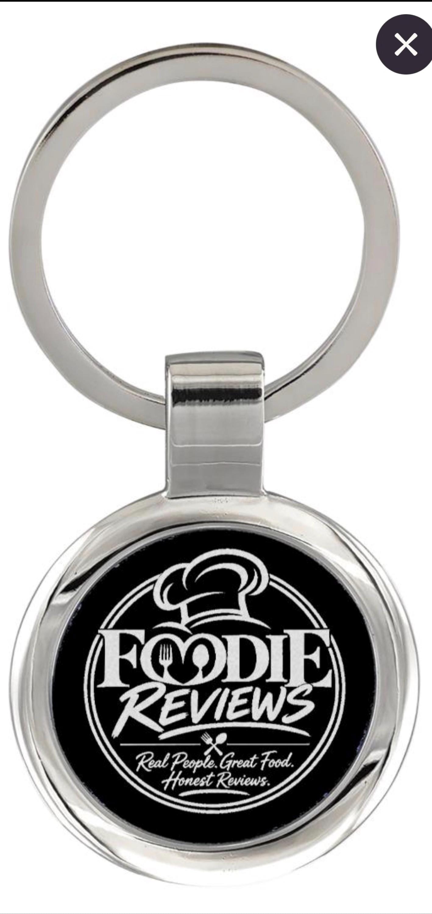 Customer photo of Custom Logo Etched Metal Keychain from Claresa