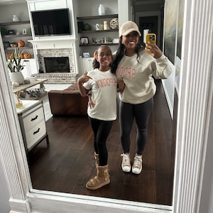 Miesha added a photo of their purchase